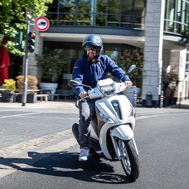 Motorradhelm mit Headset SENA Outstar S mattschwarz